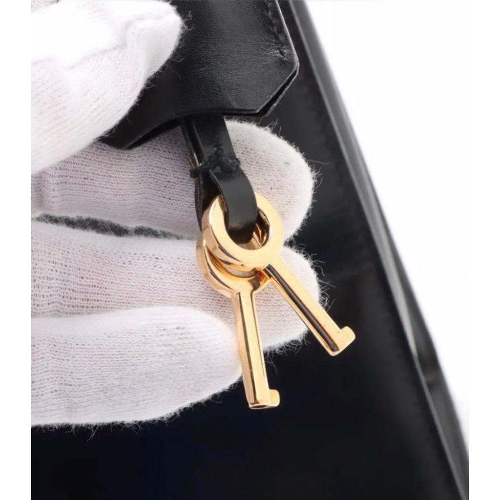 GUCCI Vintage Lady Lock Top Handle Black Leather Bag, Red Interior